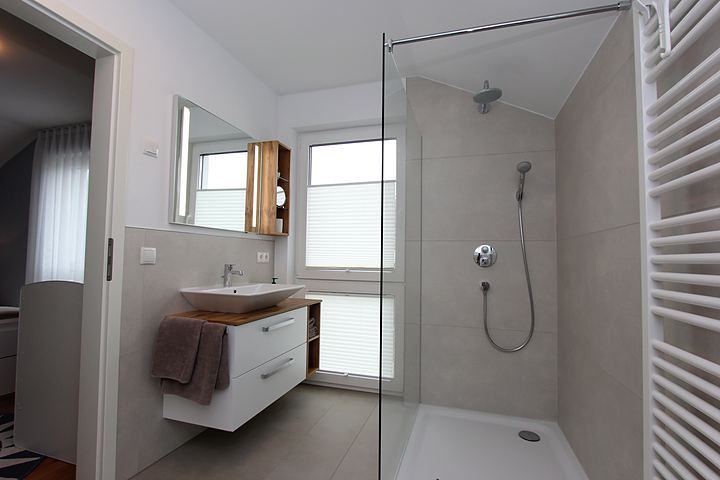Shower room with walk-in shower and washbasin